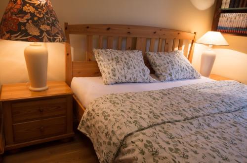 Posteľ alebo postele v izbe v ubytovaní Apartament Mundus