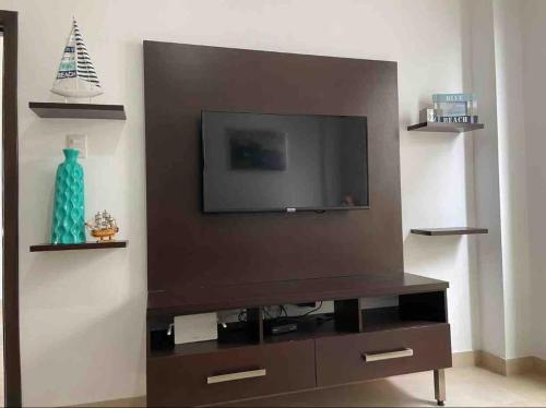 Μια τηλεόραση ή/και κέντρο ψυχαγωγίας στο Comfortable apartment of Playa en Punta Blanca