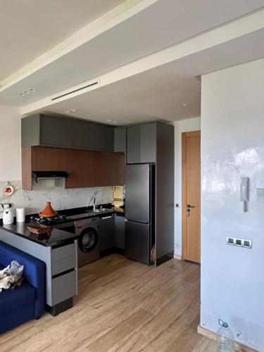 Η κουζίνα ή μικρή κουζίνα στο Relaxing Apartment Oceanic Sidi Rahal