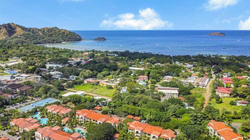 an aerial view of a resort near the ocean at Costa Elena at Naumi, Ocean Views & Beach Club in Sardinal