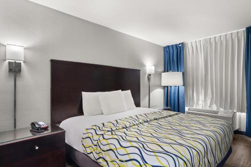 Letto o letti in una camera di Suburban Studios
