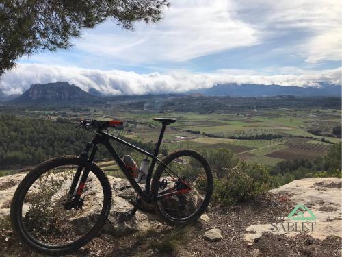 a bike parked on the side of a hill at Can Sablet in Horta de San Joan