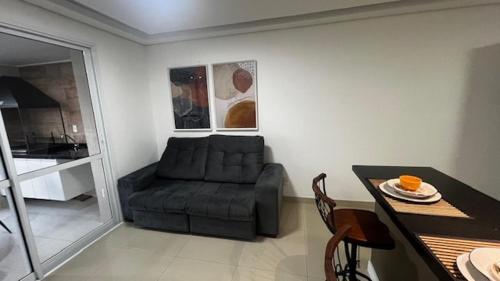 Ein Sitzbereich in der Unterkunft 1811 studio guarulhos