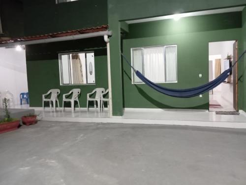 Balkoni atau teres di Casa pousada verde Guarapari