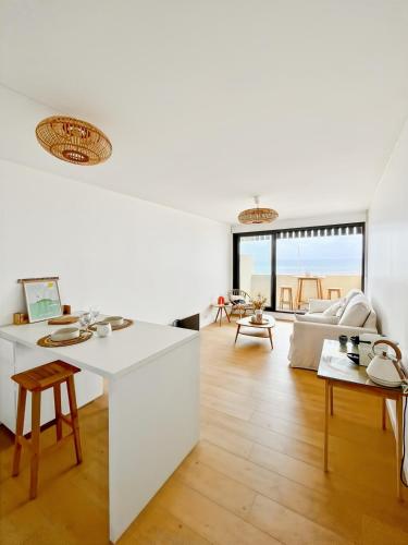 Katil atau katil-katil dalam bilik di Appartement LACANAU avec vue sur l'ocean 2 ou 4 personnes