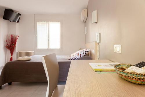 Ruang duduk di Logis Hotel Restaurant Le Flamant Rose camargue