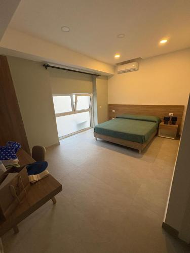 Postel nebo postele na pokoji v ubytování Calì room