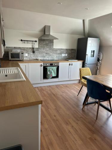 Kuchyň nebo kuchyňský kout v ubytování Wheatsheaf Flat