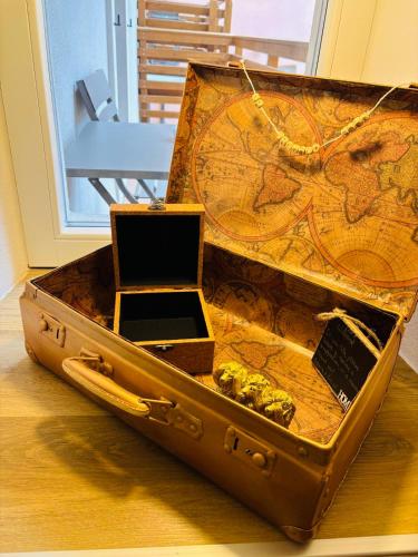 a suitcase with a laptop sitting inside of it at Le vecchie mura in Arco
