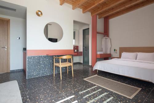 Cama o camas de una habitación en FOS Luxury Suites