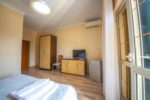 Una cama o camas en una habitación de Grand Hotel