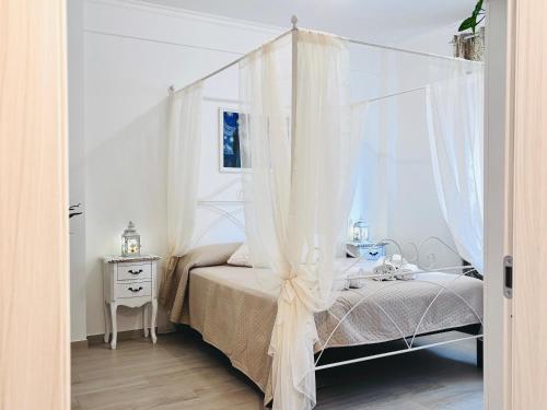Postel nebo postele na pokoji v ubytování Il Violoncello B&B