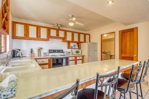 a kitchen with a counter top and a sink at Bahia Pez Vela Villa at 18 in Ocotal