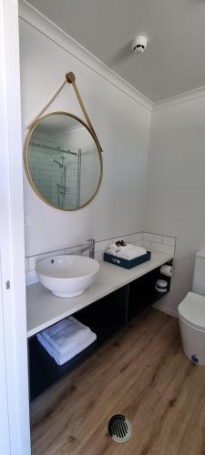 Ein Badezimmer in der Unterkunft Hideaway of Rotorua