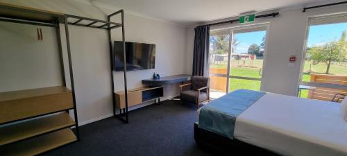 Ein Bett oder Betten in einem Zimmer der Unterkunft Hideaway of Rotorua