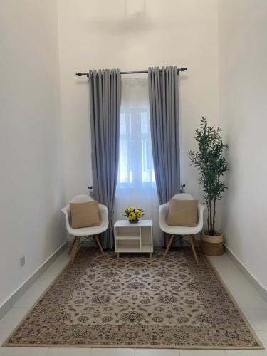 Χώρος καθιστικού στο Homestay Rindu Houz Bandar Mahkota Banting