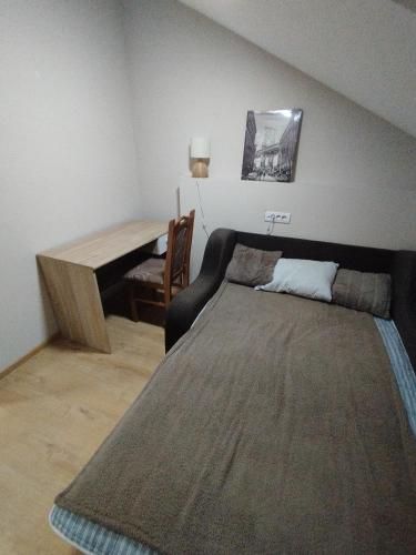 Una cama o camas en una habitación de Belgrade Green Apartman Beograd