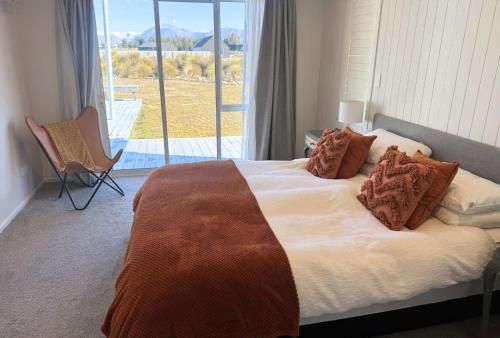 Ένα ή περισσότερα κρεβάτια σε δωμάτιο στο The Lake House