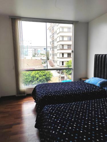 Postel nebo postele na pokoji v ubytování 2p Departamento en Torres Ventura