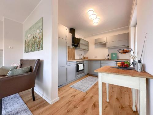 a kitchen and dining room with a table and a couch at Hochfels in Stadlern