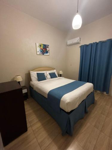 Ένα ή περισσότερα κρεβάτια σε δωμάτιο στο Sorina's Apartments