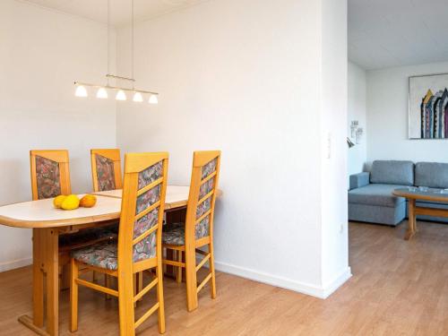 a dining room with a table and chairs at 4 person holiday home in Ansager-By Traum in Ansager
