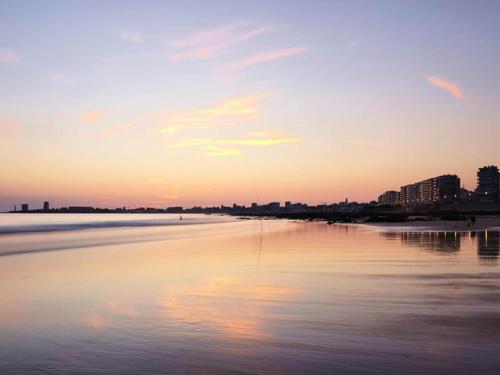 a view of a beach at sunset at Luxury Retreat in Hornbaek - By Traum Ferienwohnungen in Hornbæk