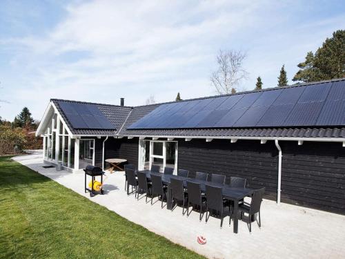 a house with solar panels on the side of it at Luxury Retreat in Hornbaek - By Traum Ferienwohnungen in Hornbæk