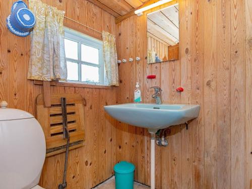 a bathroom with a sink and a toilet at 4 person holiday home in Grenaa-By Traum in Grenå