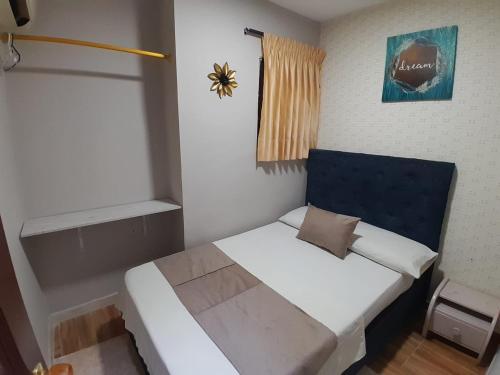 Una cama o camas en una habitación de Hotel Bahia Suite In