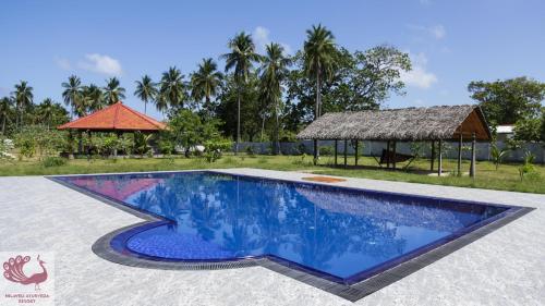 Swimming pool sa o malapit sa Nilaveli Ayurveda Resort