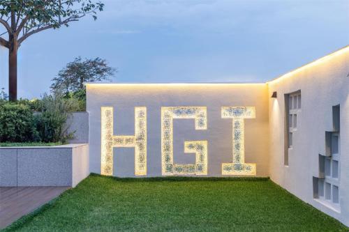 a house with the word life written on the side of it at Hilton Garden Inn Zhuji East in Shaoxing