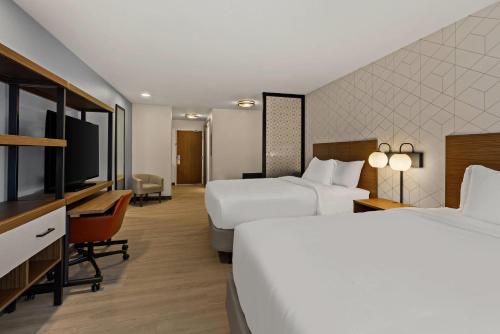 Letto o letti in una camera di Everhome Suites Kalispell