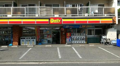 an empty parking lot in front of a store at Calm Flat Hiyoshi in Yokohama