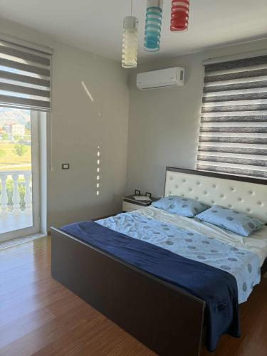 Postel nebo postele na pokoji v ubytování Korcari vila in Bulgarec
