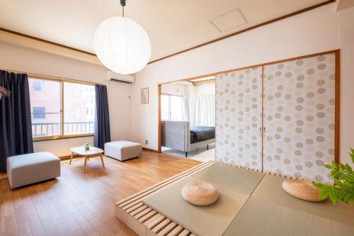 Ruang duduk di 5 min walk from Matsumoto station Sky View Apartments Spacious 4BDR
