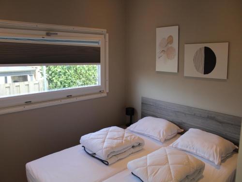 Ένα ή περισσότερα κρεβάτια σε δωμάτιο στο Apartment with Sauna and Terrace in Gelderland