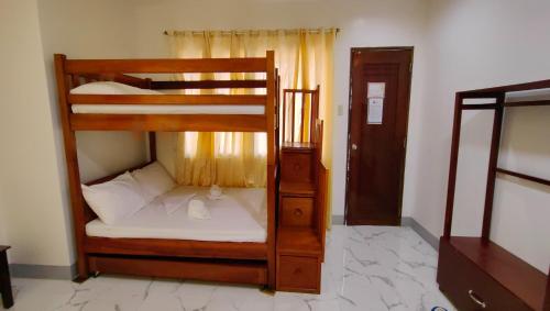 Кровать или кровати в номере Pring Pension House