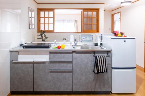 Dapur atau dapur kecil di 5 min walk from Matsumoto station Sky View Apartments Spacious 4BDR