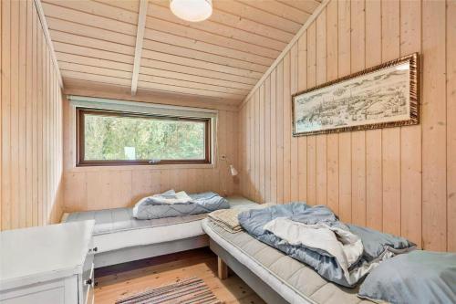 Giường trong phòng chung tại 15502-Farevejle-Lyngbakken-12