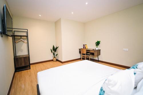 Postel nebo postele na pokoji v ubytování Kingston Hotel 6 - Changkat, Bukit Bintang