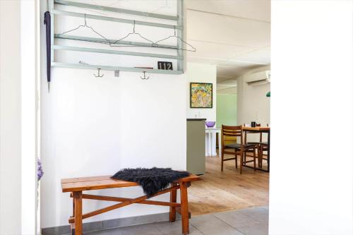a living room with a bench and a table at 11867-Nykobing-Sj-Klintvej-112 in Klint