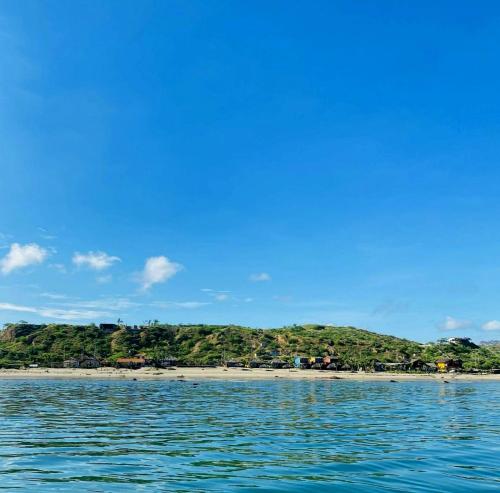 a view of a beach from a boat in the water at casaNorte paraíso norteño mirador de Ballenas in Canoas De Punta Sal