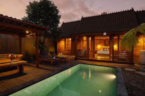 Πισίνα στο ή κοντά στο Bali Holiday Ubud