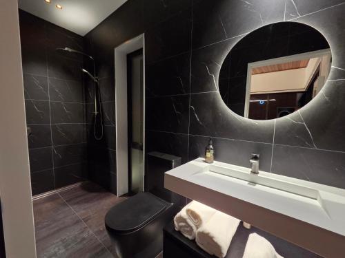 a bathroom with a sink and a mirror at Lakeview Tekapo in Lake Tekapo