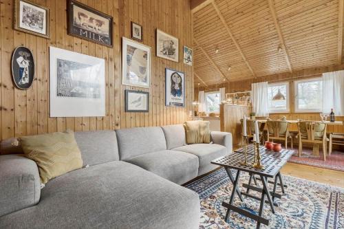 a living room with a couch and a table at 8116-Ega-Under-Ronnene-37 in Egå