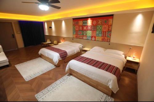 Postel nebo postele na pokoji v ubytování Rainbow Hoilday Resort