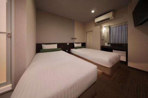 Katil atau katil-katil dalam bilik di Nipponbashi Crystal Hotel