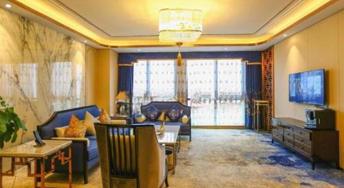 Televisyen dan/atau pusat hiburan di Hou Yi Grand Hotel