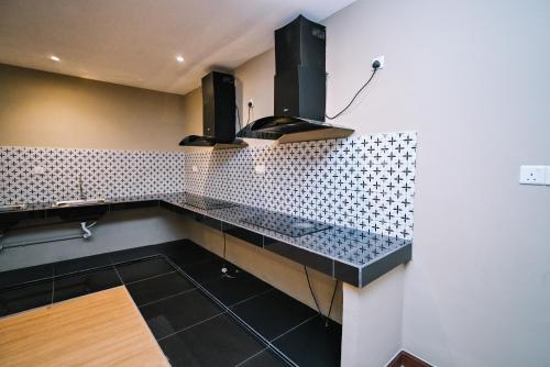 Kuchyň nebo kuchyňský kout v ubytování Kingston Hotel 6 - Changkat, Bukit Bintang